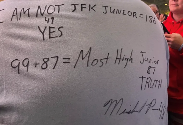 Close view of a handwritten inscription on a shirt