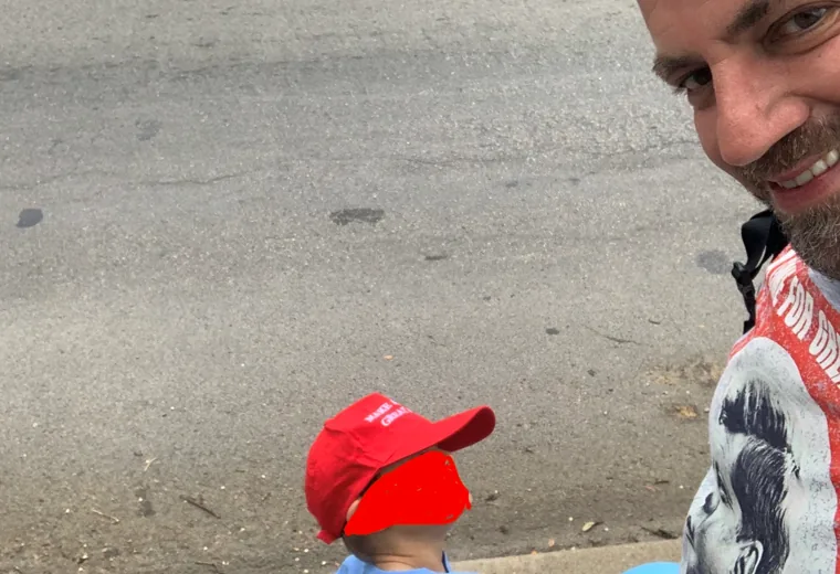 Street-level scene beside a small blue and red figure